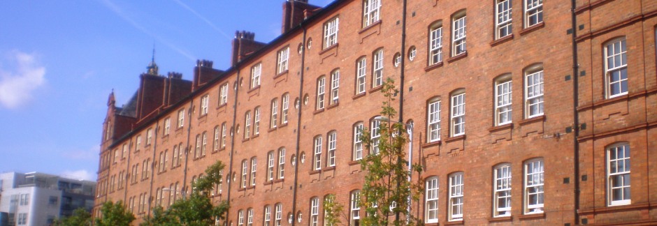 Restored Victorian red-brick tenement building